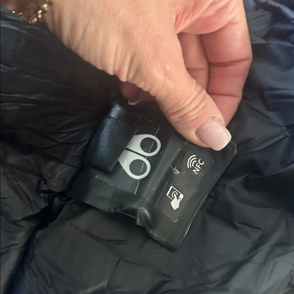 Moose Knuckles black hooded puffer with hologram imprint logo size small